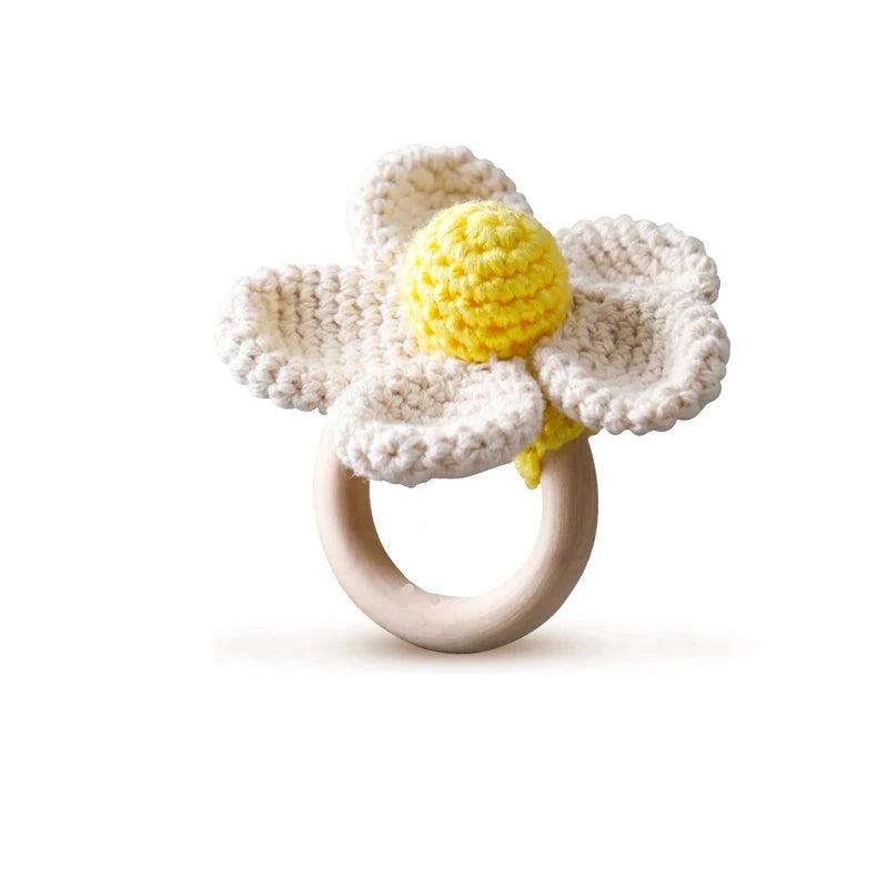 Rattle with different crocheted motifs