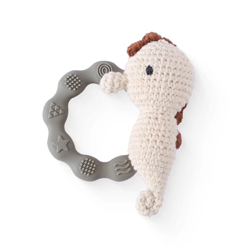 Rattle with different crocheted motifs