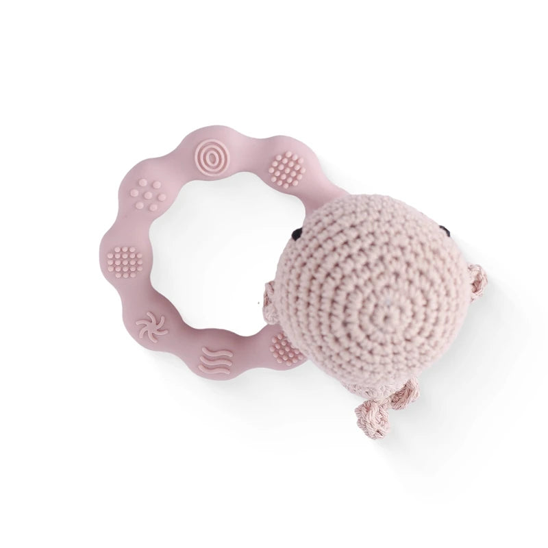 Rattle with different crocheted motifs