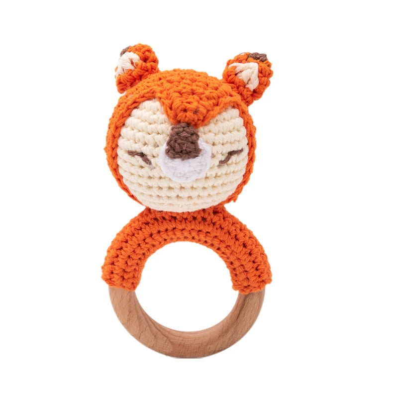Rattle with different crocheted motifs
