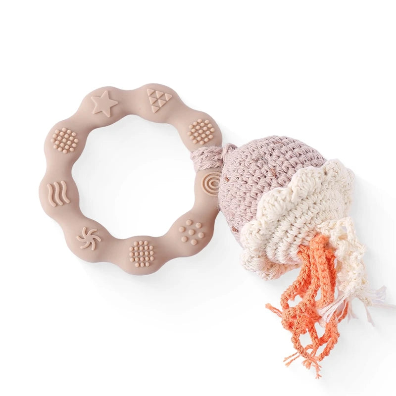 Rattle with different crocheted motifs