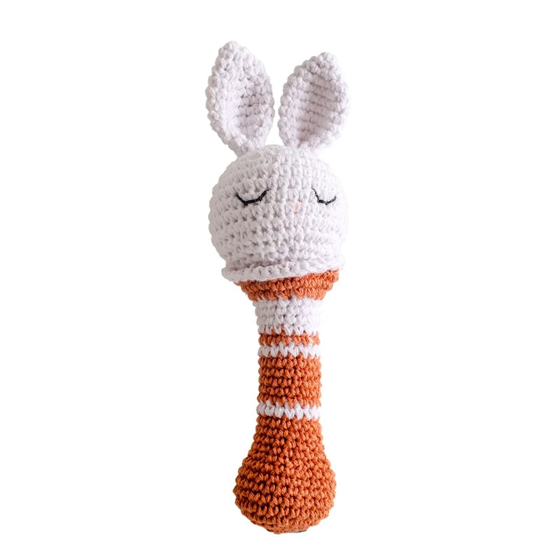 Rattle with different crocheted motifs