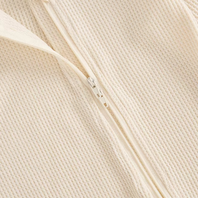 Strampler mit Mütze