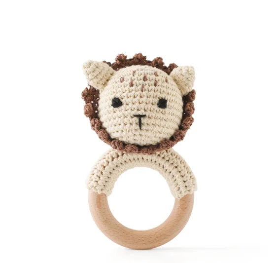 Rattle with different crocheted motifs
