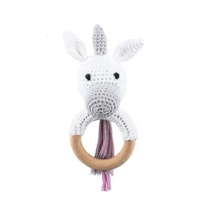 Rattle with different crocheted motifs
