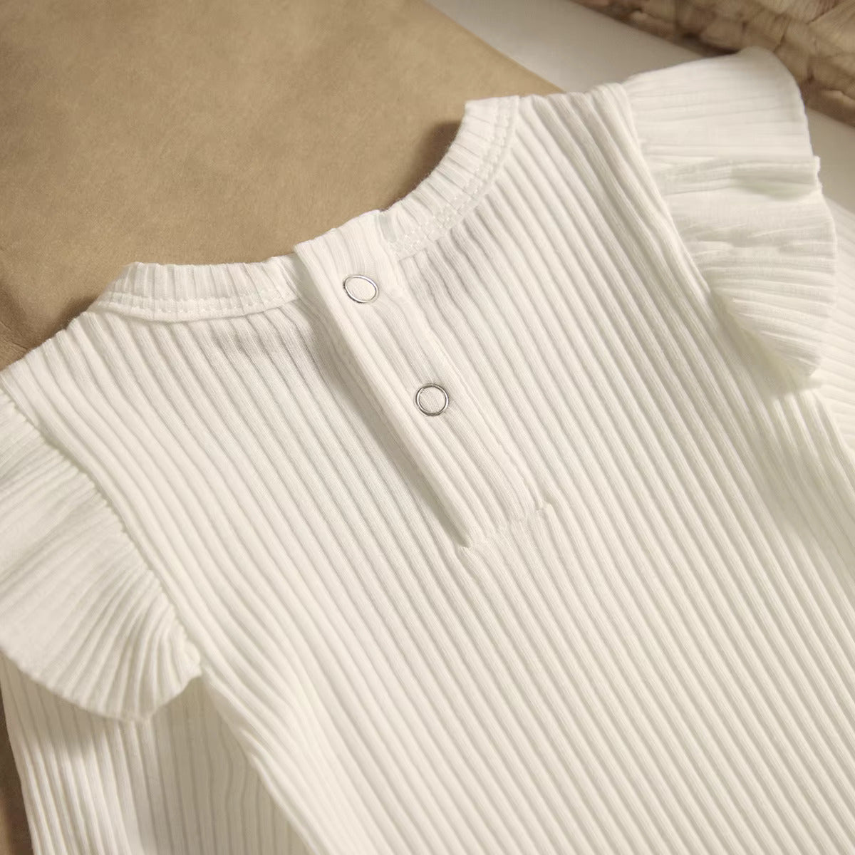bodysuit with ruffled sleeves