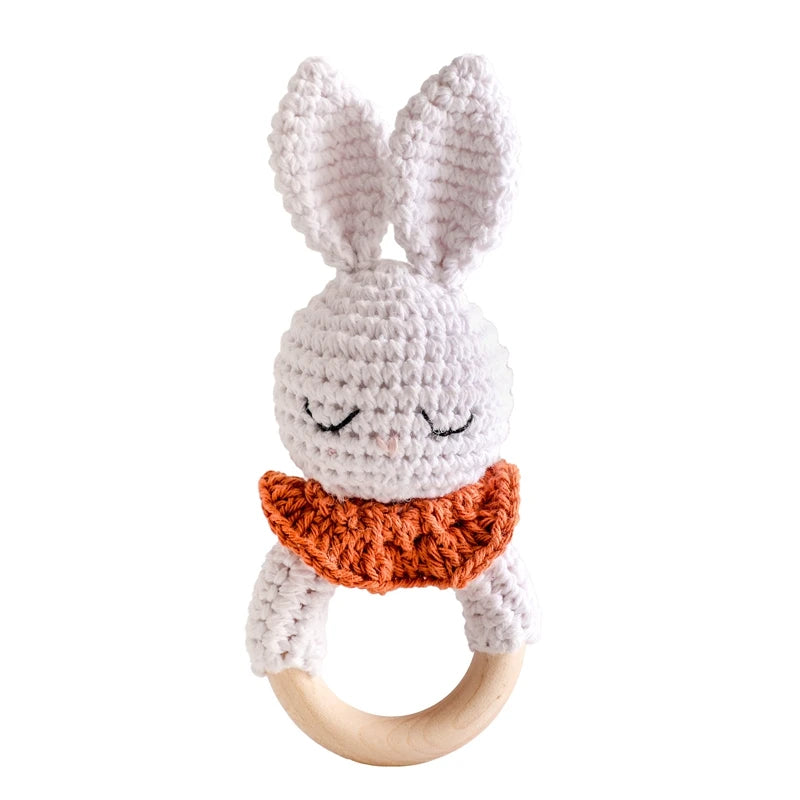 Rattle with different crocheted motifs