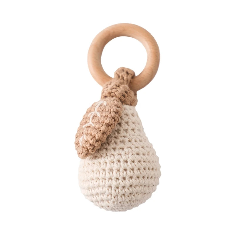 Rattle with different crocheted motifs