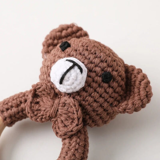 Rattle with different crocheted motifs